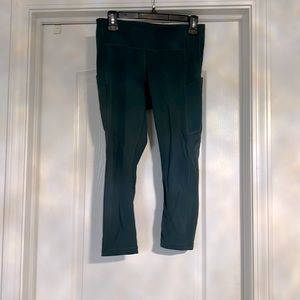 Lululemon capri leggings a color between green, gray and teal. Hardly worn